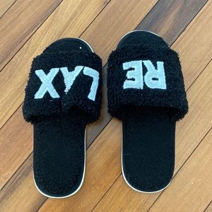 Black "RELAX" slippers